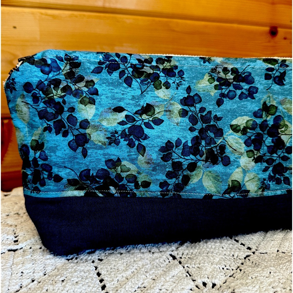 Beautiful blue bag in blue floral hues and solid blue bottom.